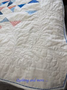 Corner quilted feather spray