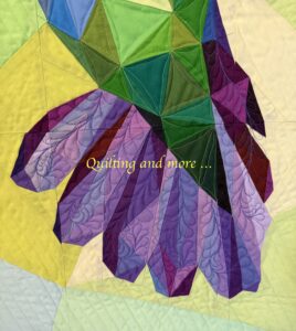 Detail of quilting on hummingbird's tail.